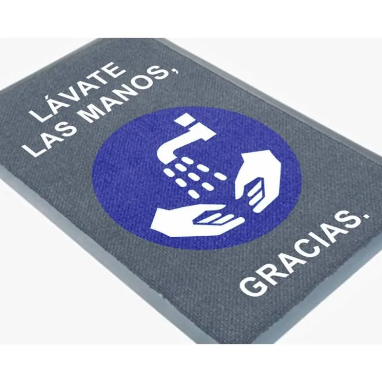 ALFOMBRA PARA SUELO DE PASO NOVUS LAVATE LAS MANOS GRACIAS FONDO GRIS 90X60 CM