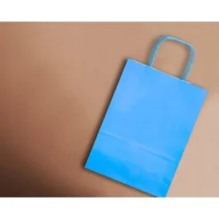BOLSA PAPEL Q-CONNECT CELULOSA CELESTE M CON ASA RETORCIDA 270X370X12 MM