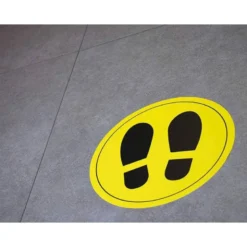 CIRCULO DE SEÑALIZACION ADHESIVO APLI PARA SUELO PVC 100 MC PIES COLOR AMARILLO/NEGRO DIAMETRO 30 CM