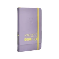 CUADERNO CON GOMILLA ANTARTIK NOTES TAPA DURA A6 HOJAS LISAS MORADO Y AMARILLO 100 HOJAS 80 GR FSC