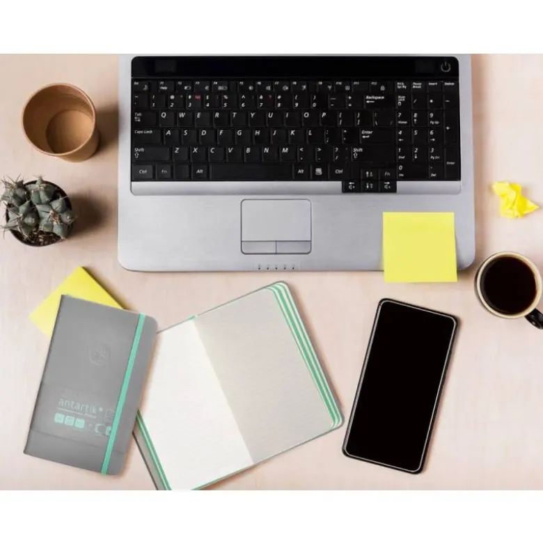 CUADERNO CON GOMILLA ANTARTIK NOTES TAPA DURA DIN A6 HOJAS RAYAS GRIS Y TURQUESA 100 HOJAS 80 GR FSC