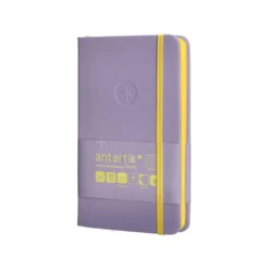 CUADERNO CON GOMILLA ANTARTIK NOTES TAPA DURA A6 HOJAS CUADRICULA MORADO Y AMARILLO 100 HOJAS 80 GR FSC