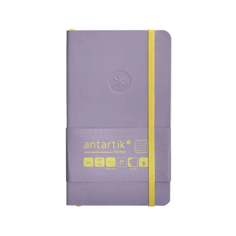 CUADERNO CON GOMILLA ANTARTIK NOTES TAPA BLANDA A6 CUADRICULA MORADO Y AMARILLO 100 HOJAS 80 GR FSC