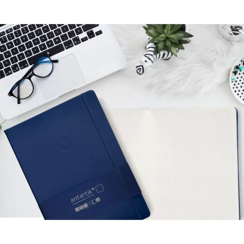CUADERNO CON GOMILLA ANTARTIK NOTES TAPA DURA A4 HOJAS PUNTOS AZUL MARINO 100 HOJAS 80 GR FSC